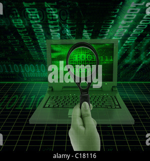Binary codes on a laptop viewed through a magnifying lens hold by a person Stock Photo