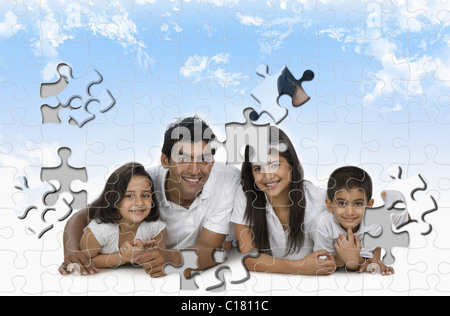 Image of a family made from jigsaw pieces Stock Photo