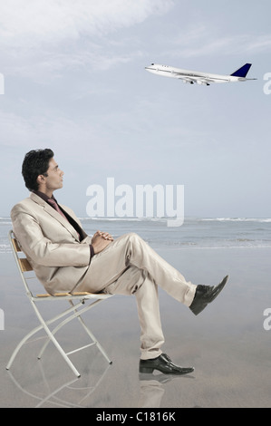 Businessman thinking about his business travel Stock Photo