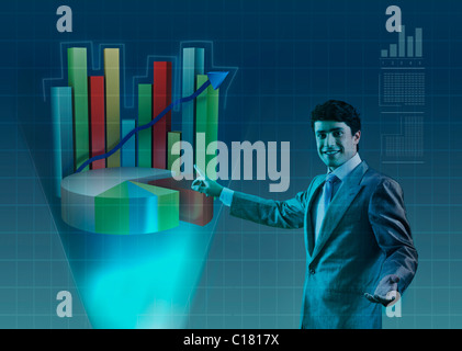 Businessman pointing at a bar graph Stock Photo
