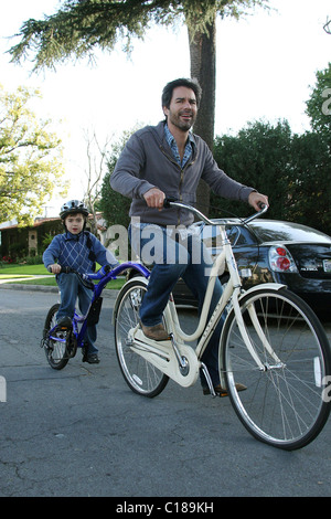 Eric McCormack of 'Will and Grace' cycles with his son Finnigan Holden