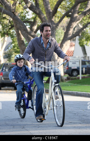 Eric McCormack of 'Will and Grace' cycles with his son Finnigan Holden