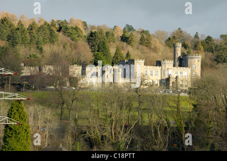 Cyfarthfa Castle Sunlit on the hillside from the opposite side of the Taff Valley Stock Photo