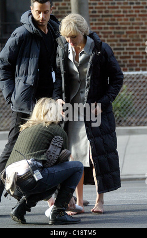 Angelina Jolie running barefoot with a bloody knee on the set of her upcoming spy thriller 'Salt' New York City, USA - 13.03.09 Stock Photo