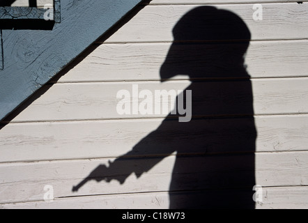 Silhouette of a gunslinger at Eaves Movie Ranch, near Santa Fe, New Mexico Stock Photo