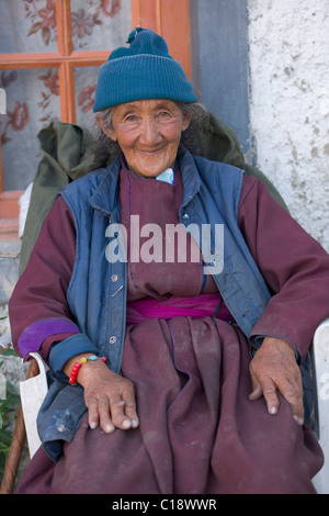 Old Ladakhi woman in traditional dress at Lamayuru, (Ladakh) Jammu & Kashmir, India Stock Photo