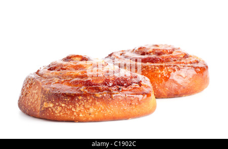 two sweet buns with cinnamon isolated on white Stock Photo