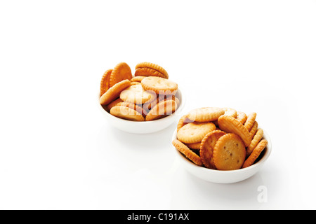Salted cookies in white bowls Stock Photo