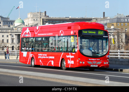 Environmentally friendly red Hydrogen fuel cell technology zero emissions bus on public transport for London route RV1 on Waterloo Bridge England UK Stock Photo