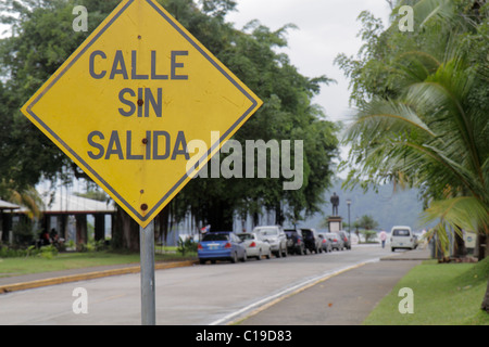 Panama,Latin,Central America,Panama City,Amador,street scene,traffic,road,sign,logo,Spanish language,bilingual,no exit,dead end,diamond shape,yellow,v Stock Photo