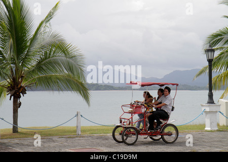 Panama,Latin,Central America,Panama City,Amador Causeway,Calzada de Amador,Bahia de Panama,Panama Canal,recreation area,quadricycle,four wheel bicycle Stock Photo