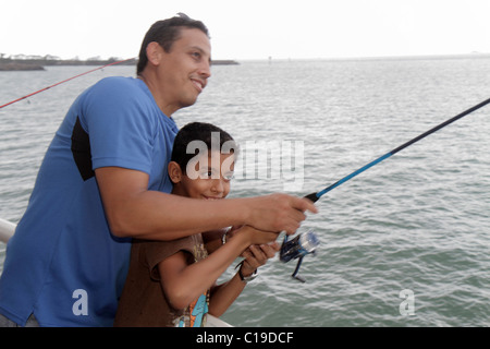 Man fishing on canal using a roach pole in warm weather Stock Photo - Alamy