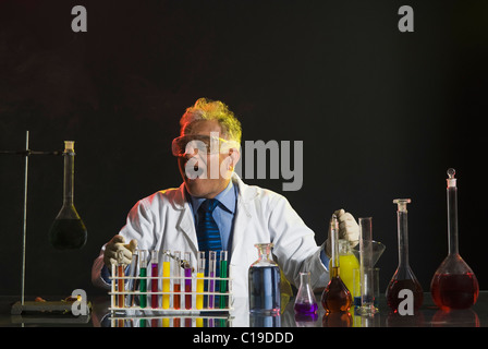 Scientist doing scientific experiment in a laboratory Stock Photo