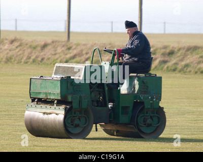 Old man on a sit on roller, UK