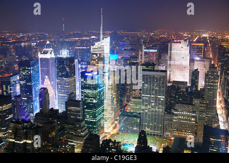 New York City Manhattan Times Square skyline aerial view panorama at night with skyscrapers and street. Stock Photo
