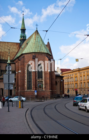 Tram lines outside the Church of St. Francis of Assisi from All Saints Square, Kraków, Poland. Stock Photo