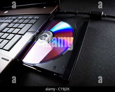 Optical disc drive on a modern laptop computer.. Stock Photo