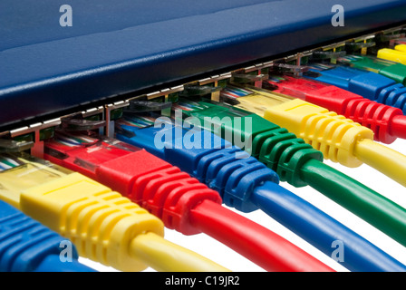 Macro closeup on colored network cables attached to a router or switch Stock Photo