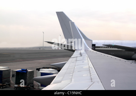 aircraft airplane landed wing perspective in airport Stock Photo