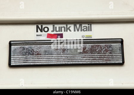 No junk mail sign on the front door of a house in a U.K. city. Stock Photo