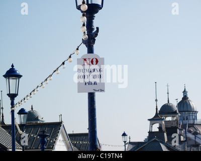 No jumping off the pier sign at Eastbourne pier in East Sussex