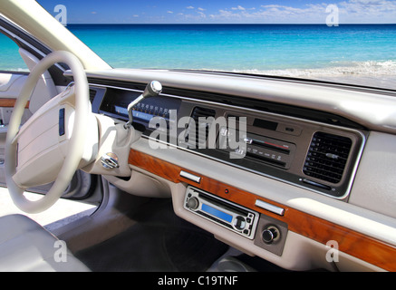 car indoor retro vintage with tropical Caribbean beach in window Stock Photo