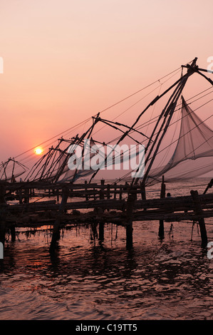 Row of Chinese fishing nets in the sea, Kochi, Kerala, India Stock Photo