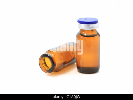 two glass bottles with medicine overn white background Stock Photo