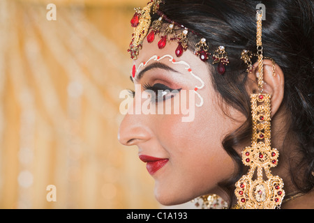Close-up of a bride wearing jewelry Stock Photo