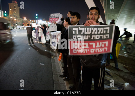 Protest calling for revenge following the funeral of the Fogel family murdered Friday in Itamar. Jerusalem, Israel. 13/03/2011. Stock Photo