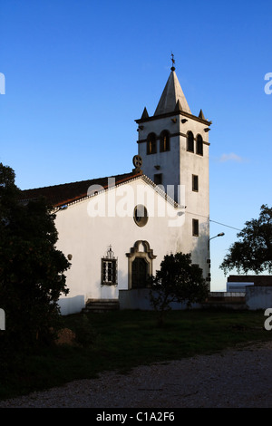 Side profile view of a small christian church on the village of Barranco do Velho in Algarve, Portugal. Stock Photo