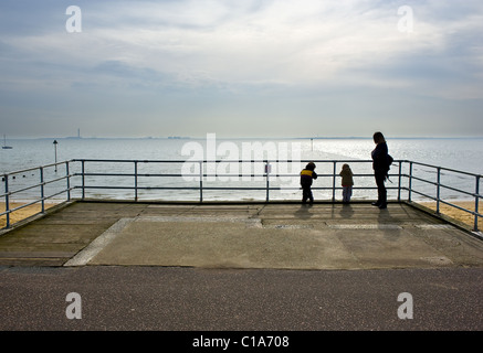 A mother and her two children on Southend seafront. Stock Photo