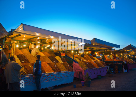 Nut and dried fruit stalls at dusk at Djemaa el-Fna square Medina old town Marrakesh central Morocco Africa Stock Photo