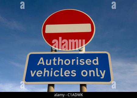 no entry warning sign on road apart from authorised vehicles uk Stock Photo