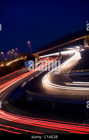 headlight trails of traffic travelling on the A1/M motorway near Leeds Yorkshire UK Stock Photo
