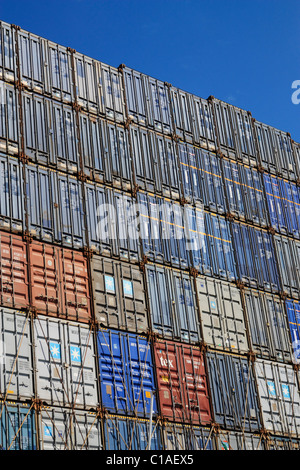 Shipping containers stacked on ship Stock Photo