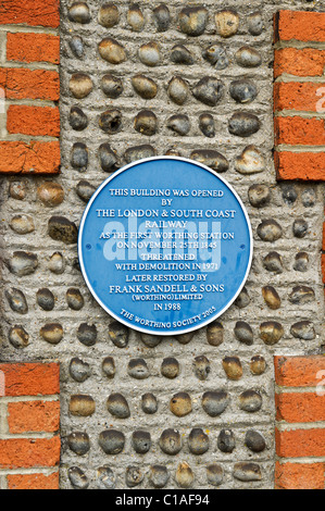 The plaque on the wall of the first Worthing Railway Station which was saved by Frank Sandell and Sons Stock Photo