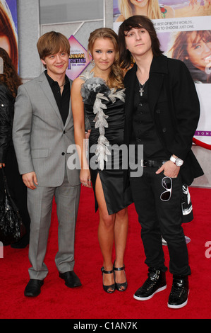 Jason Earles, Emily Osment and Michael Musso World Premiere of Walt Disney Pictures 'Hanna Montana The Movie' held at the El Stock Photo