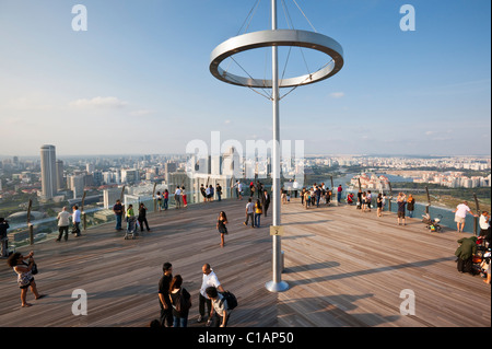 Visitors on the observation deck of the Marina Bay Sands SkyPark.  Marina Bay, Singapore Stock Photo