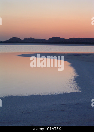 The lake at Siwa Oasis, an isolated oasis in the Northwest central area of Egypt's Sahara Desert, near the mud-brick Shali town Stock Photo