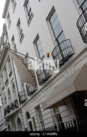 Main entrance and front facade of the popular high end salon and boutique Michael John in Albermarle Street,Mayfair. Stock Photo