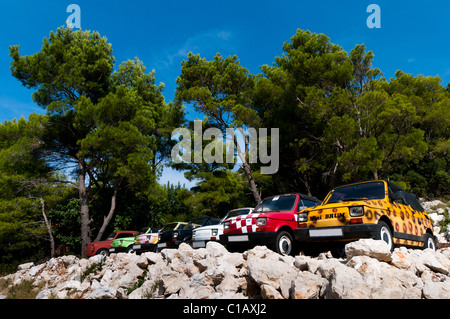 Old cars renovated and painted in bright colors Stock Photo