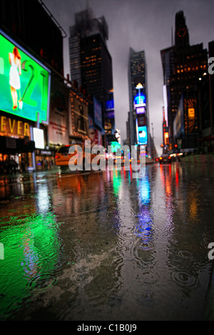 summer rain on Time Square, New York City Stock Photo