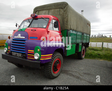 Customised and colourful Bedford hippy camper truck at Callanish Stones at Druid Festival, Isle of Leiws Stock Photo