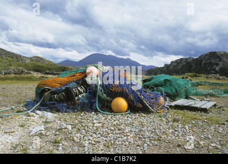 Pile of colourful commercial fishing gear piled up on harbour, Kinlochbervie, Scottish Highlands Stock Photo