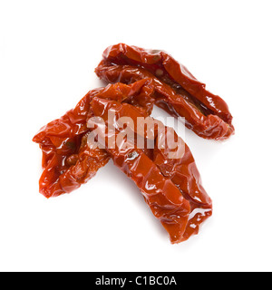 dried tomatoes on white background Stock Photo