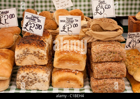 Freshly baked bread at a market stall Stock Photo