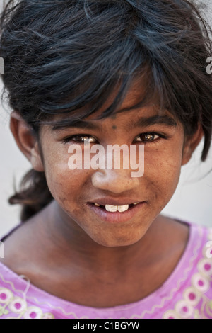 Dirty-Faced Indian Street Girl with Beautiful Smile, Andhra Pradesh State, South India Stock Photo