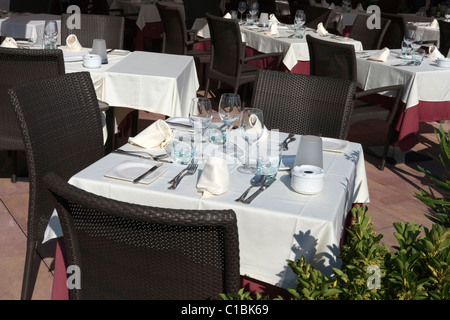 restaurant external outside chairs tables table set detail Stock Photo