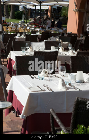 restaurant external outside chairs tables table set detail Stock Photo